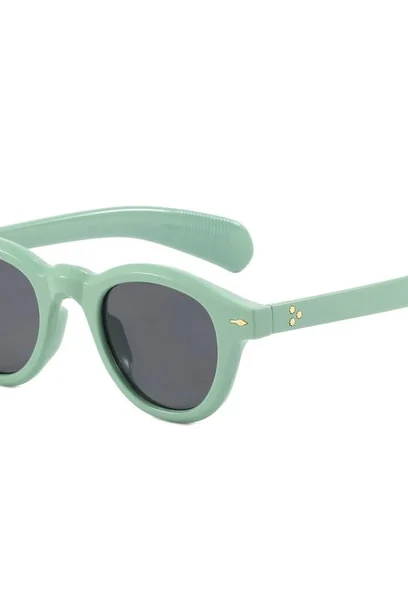 Mint green chunky sunglasses with dark lenses, photographed against white
