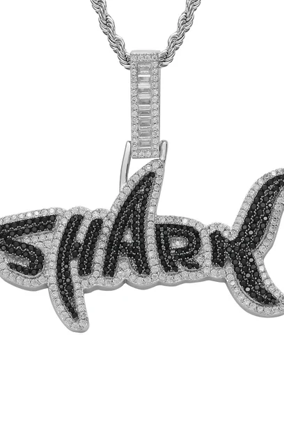 A stone-set pendant spelling out a word in block capitals, hanging from a fine chain